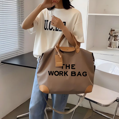 La "bolsa de trabajo" con asas dobles y correa ajustable 